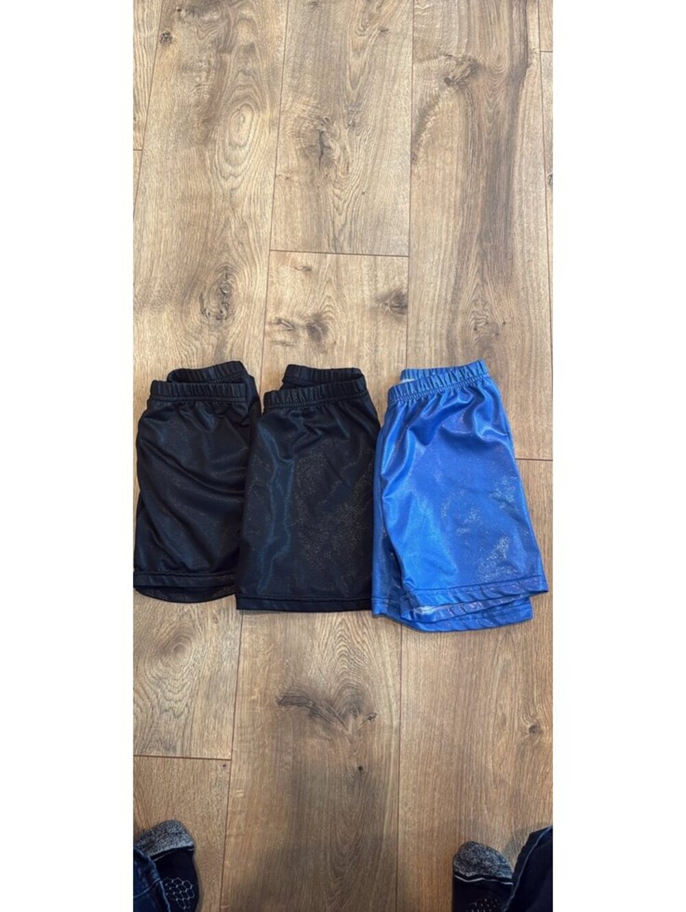 Three gymnastics shimmer bike shorts